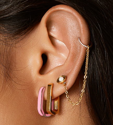 titanium gold ear stack with pink hypoallergenic hoop earrings 