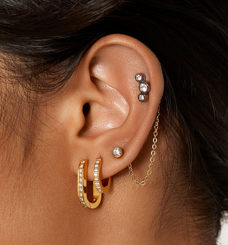 hypoallergenic ear stack with gold hoop earrings and titanium earring connector chain 