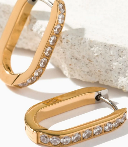 hypoallergenic gold hoop earrings with bezel set gemstones 