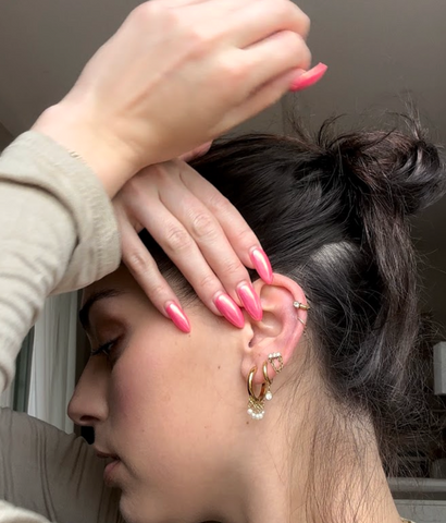 girl wearing hypoallergenic tini lux ear stack