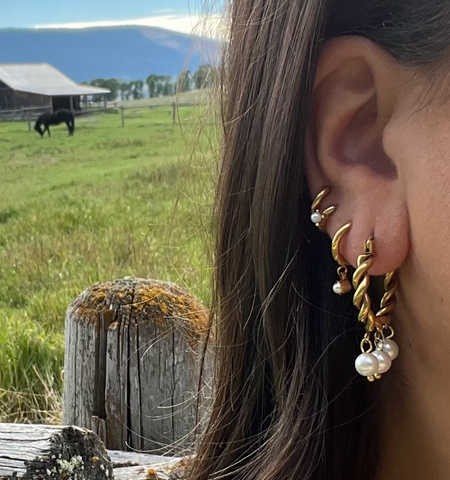 girl wearing hypoallergenic earring stack tini lux