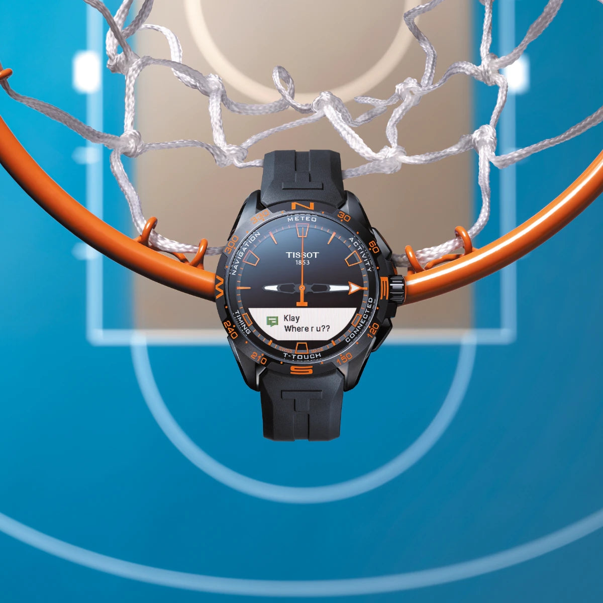 Tissot T-Touch Connected Watch with orange details on basketball hoop background