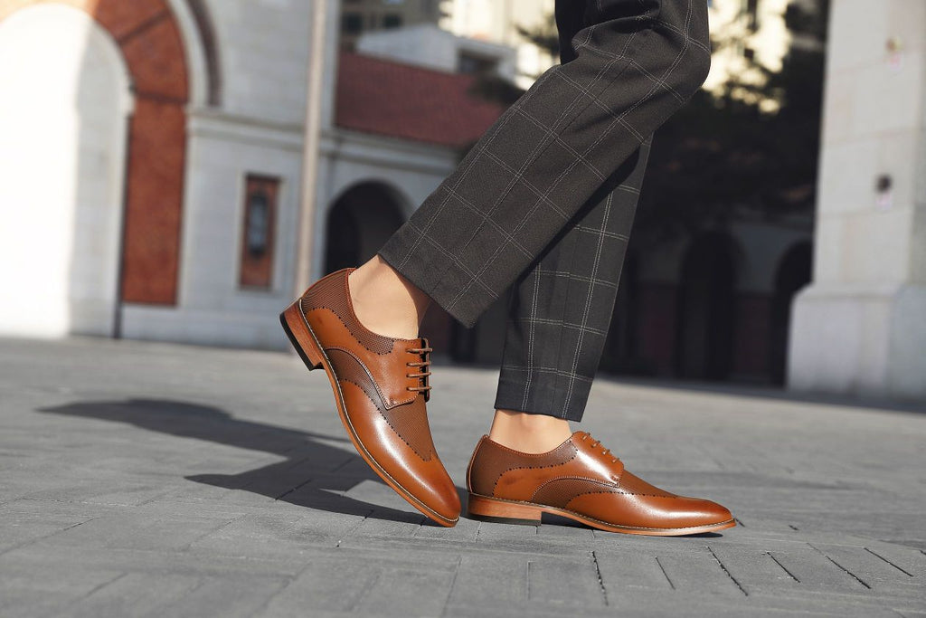a pair of dress leather shoes