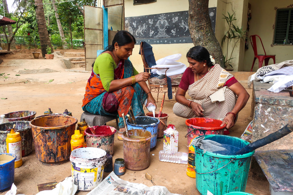 Women preparing Ayurvedic dyes in India