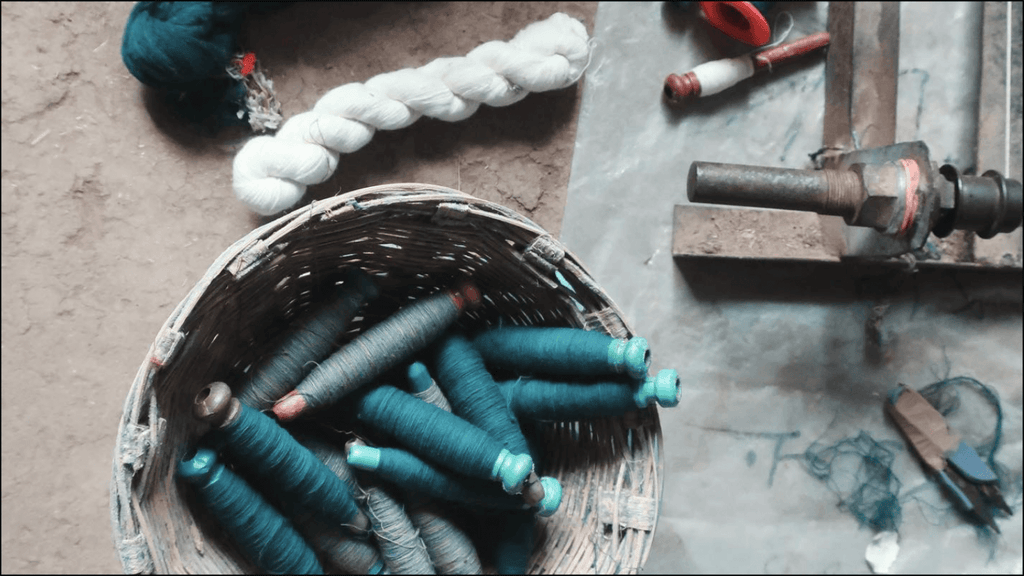 filling yarns in a basket, they will be placed in the shuttle and used for weaving