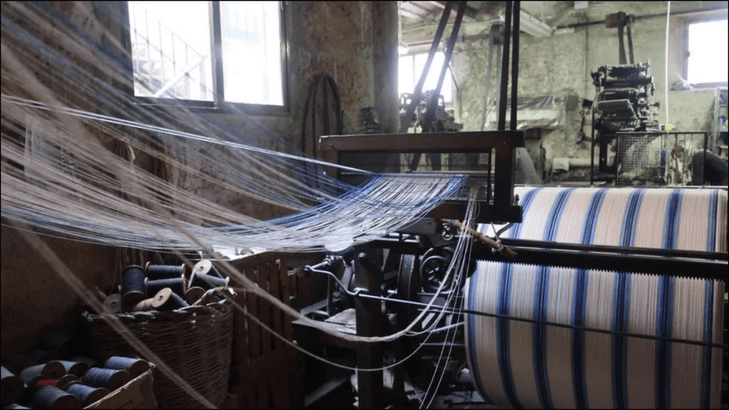 warp beam at a traditional ikat mill in mallorca spain