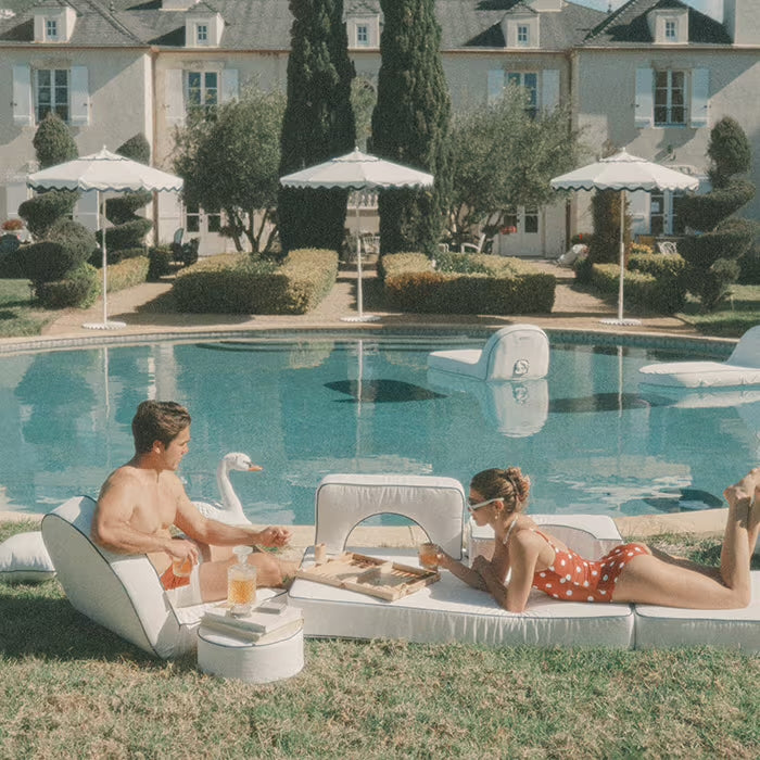 White Outdoor Cushions by a poolside