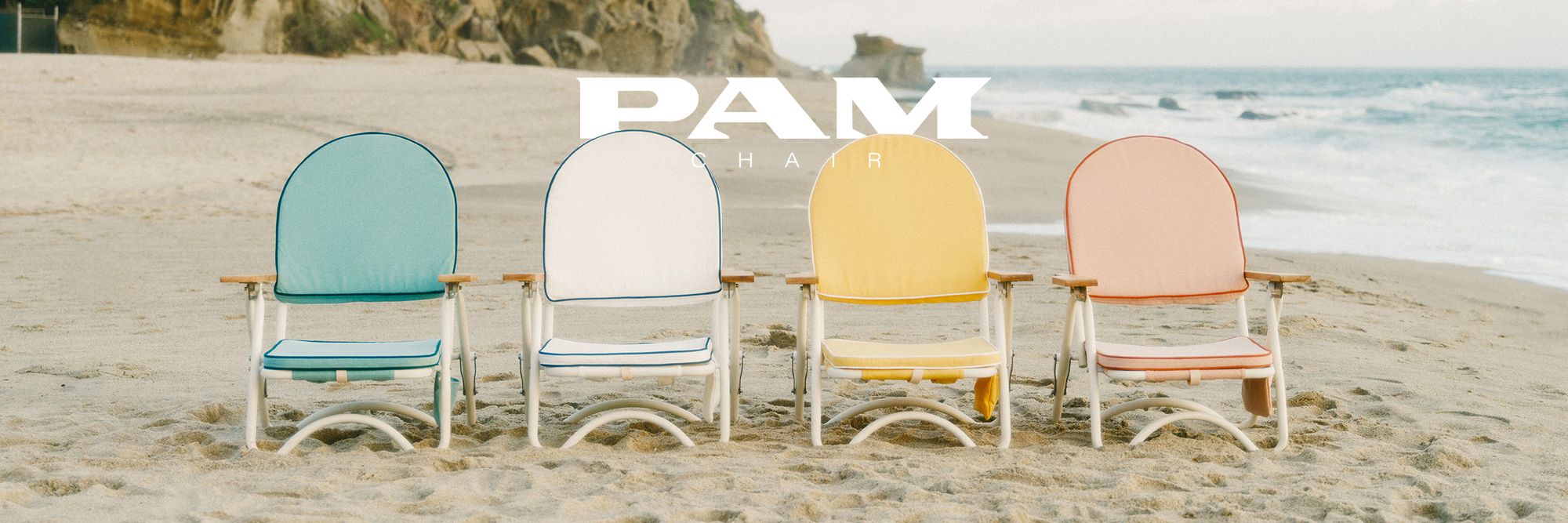 4 colorful Pam chairs on the beach