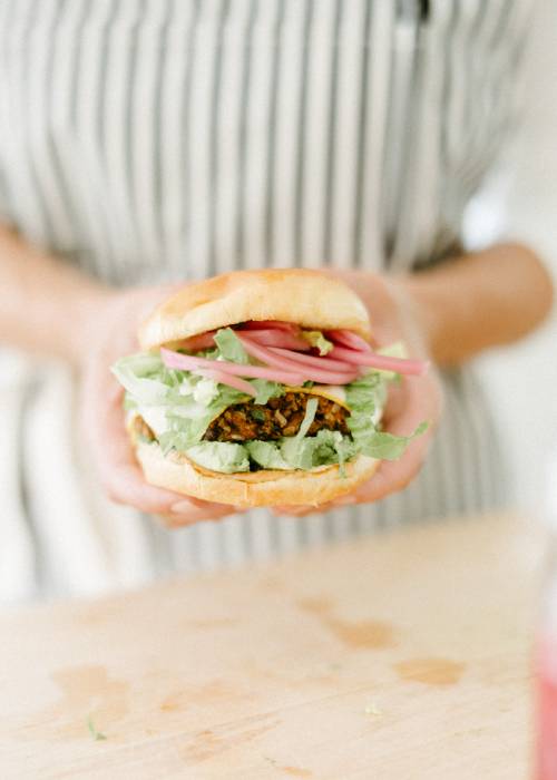 Chef holding a veggie burger