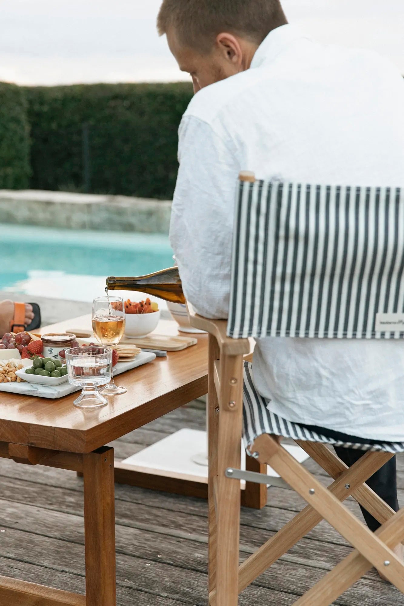 Directors chairs for afternoon dinner by the pool