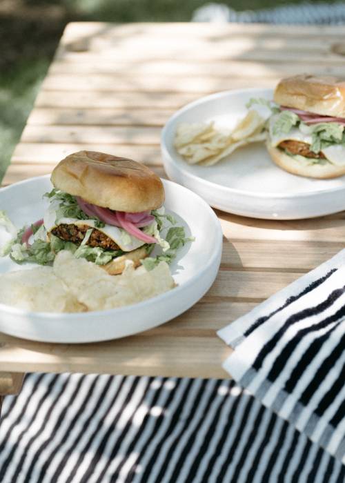 Veggie burgers on a picnic table