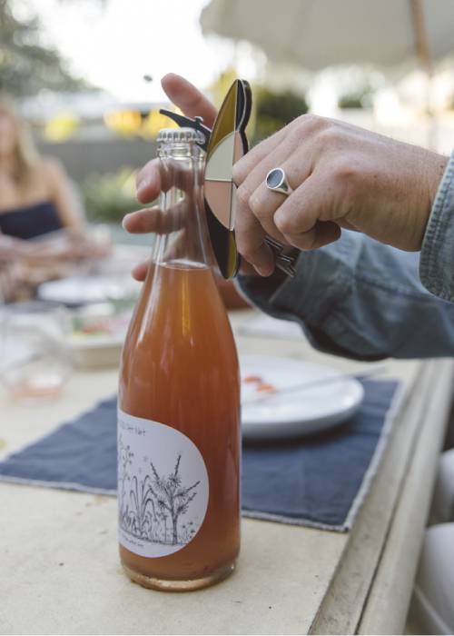 bottle of wine being opened