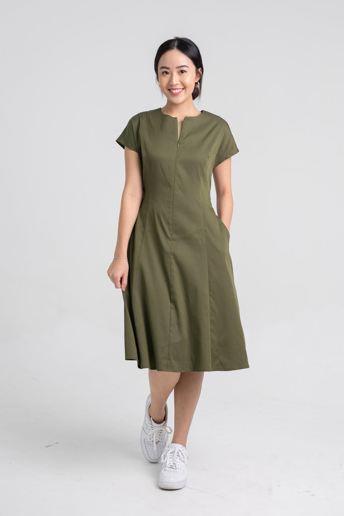 Wei Ching wearing the Midi Cap Sleeve Dress in Olive Green.