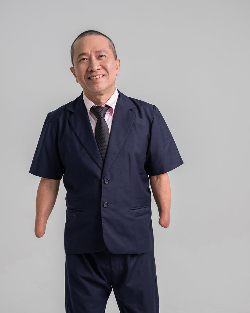 Whee Boon in his blue customised short sleeve suit jacket