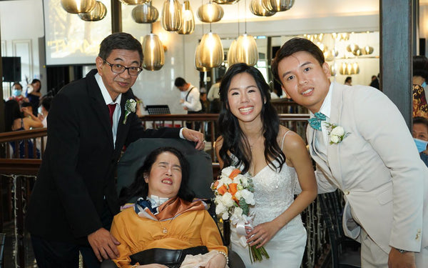 A group photo with Jane and the family at the wedding