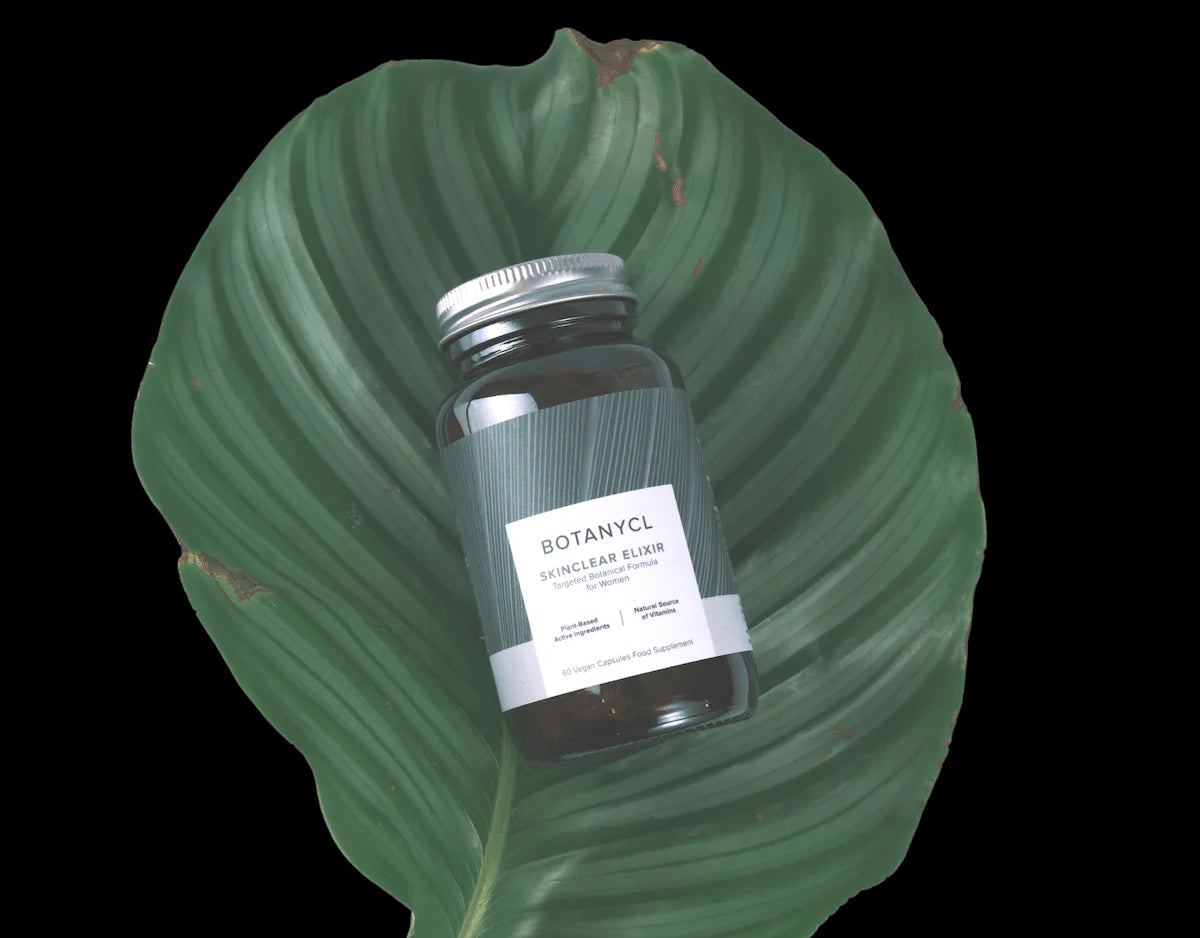 Botanycl SkinClear Elixir on a green leaf