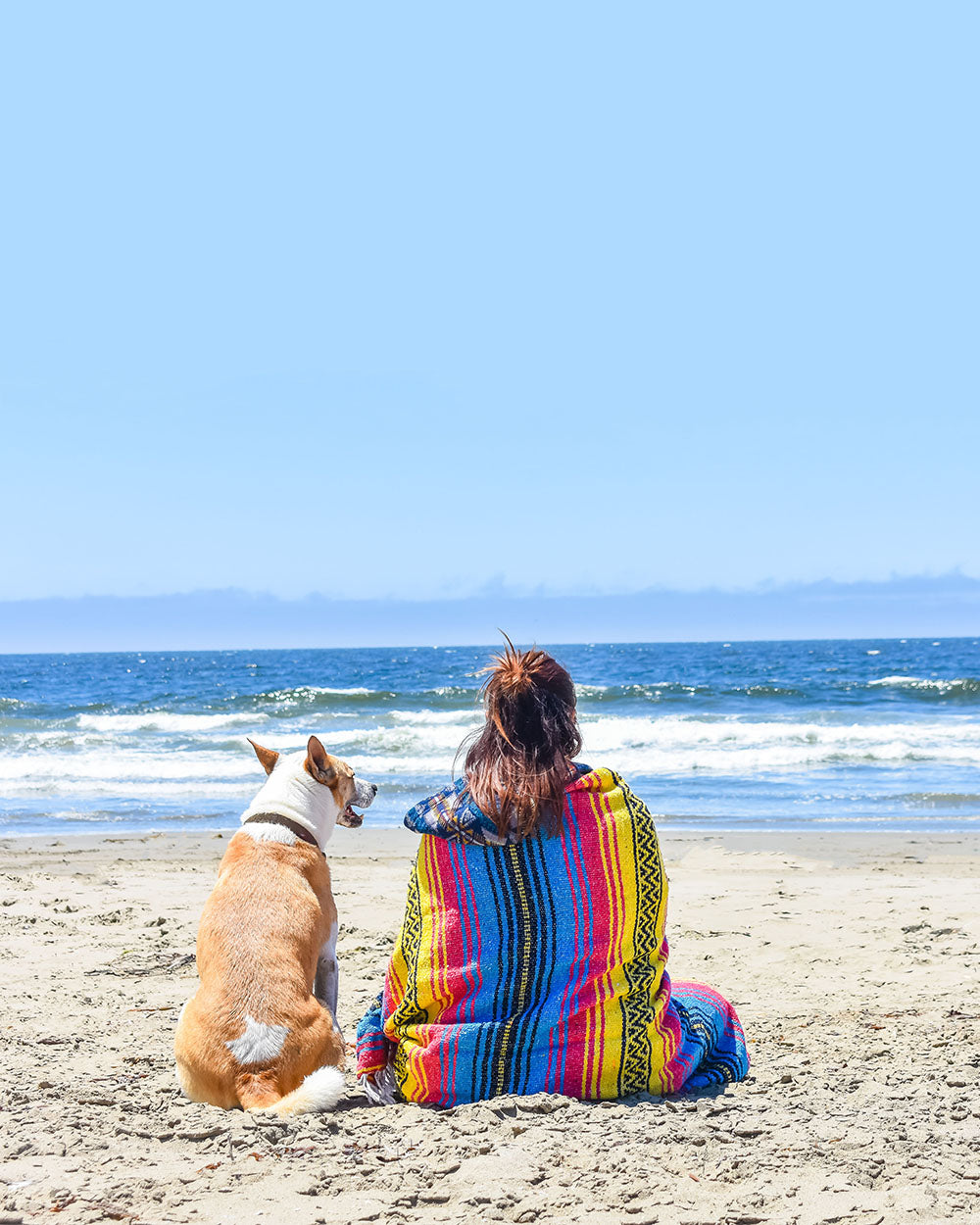 Relaxing at the beach with my best friend and my Sunshine Day Dream blanket. A cozy blanket that I can take anywhere my wanderlust spirit takes me.