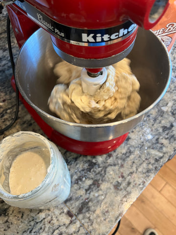 mixing sourdough bread