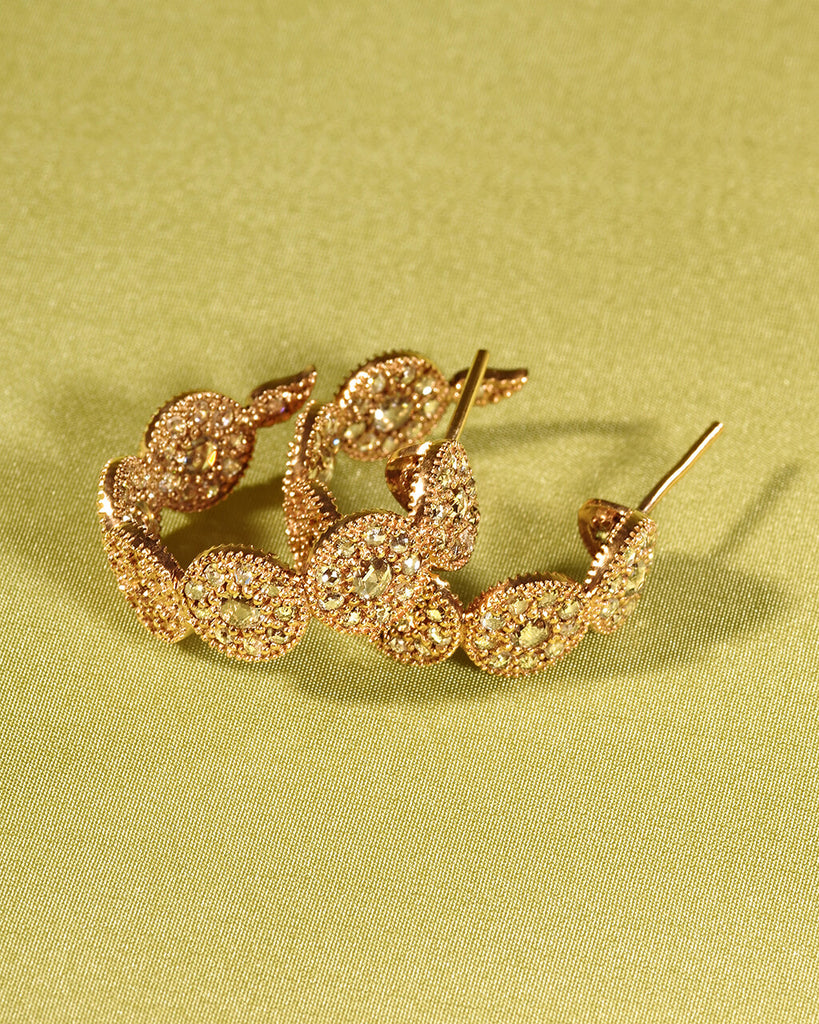 20K Yellow Gold Eternity Opera Small Hoop Earrings, $4,500. product:eternity-opera-20k-yellow-gold-small-hoop-earrings