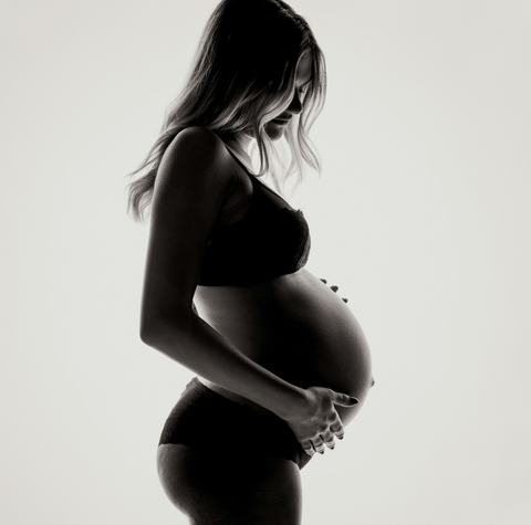 pregnant mum holding belly