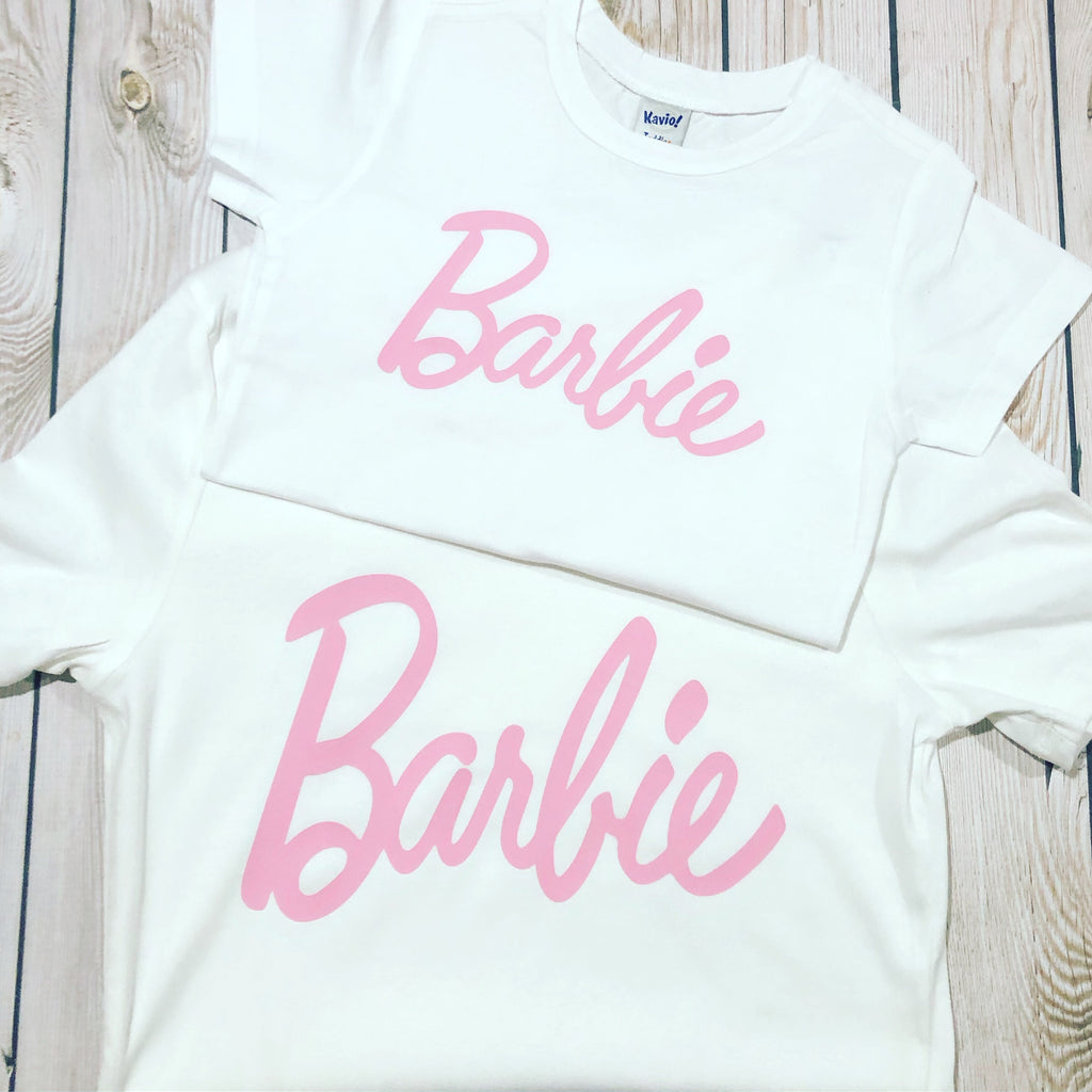 pink and white barbie shirt
