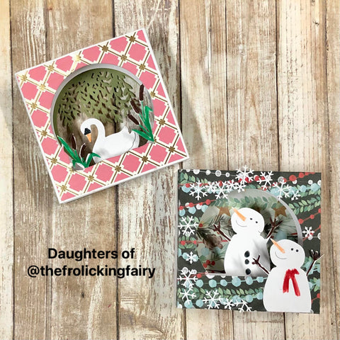 #thefrolickingfairy #i_crafterart #icrafter #tunnelcard #tunnelcardbase #tunnelcardbaseswan #tunnelcardaddon #snowglobe #letitsnow #interactive #interactivecard #christmasinjuly #nontraditionalcolors #diecutting #patternedpaper #dimensional #diorama #cardmaker #cardmaking #cardmakersofinstagram