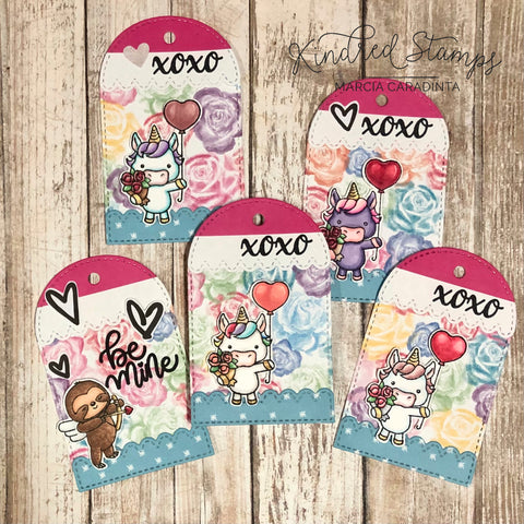 #thefrolickingfairy #kindredstamps #cupidscrew #cupid #valentine #valentinesday #valentinetreats #treatbag #candybarslider #jadedblossom #roundedtag #classroomtreats #unicorns #patternedpaper #stashbuster #spectrumnoir #alcoholmarkers #gifttag #filmstrip #filmstripdie #cardmaking #cardmaker #cardmakersofinstagram