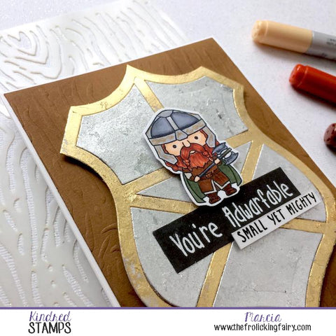 #thefrolickingfairy #kindredstamps #sizedoesntmatter #dwarf #warrior #shield #tonicstudios #gildingflakes #longjourney #adwarfable #smallyetmighty #copiccoloring #dryembossing #woodgrain #stencil #papercraft #handmade