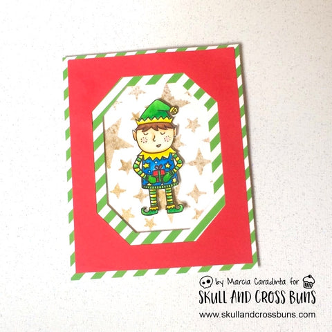 #thefrolickingfairy #skullandcrossbuns #christmassantaworkshop #christmas #santaworkshop #santasworkshop #elf #haveyourelfamerrychristmas #watercolor #arteza #realbrushpens #shimmermist #stencil #starsandsparkles #handmade #handmadecards