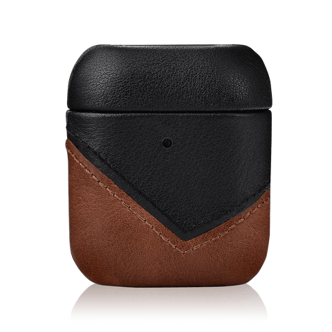 A genuine leather Airpods case placed on a plain, dark background