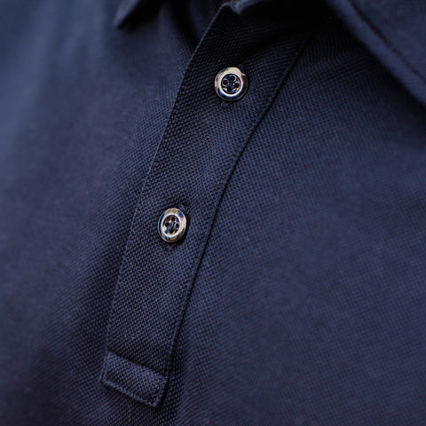 Mother-of-pearl buttons on an Italian polo shirt