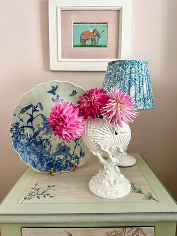 dahlias, blue and white china and block printed lampshade on top of a hand painted chest of drawers