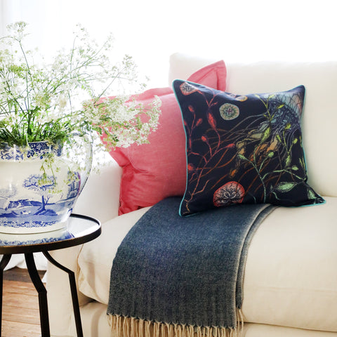 Hot Pink Chambray cushion with reef navy cushion styled on couch