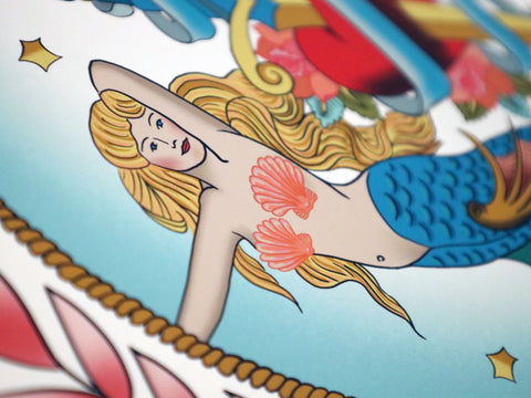 A close up of our mermaid design inspired from old sailor's tattoos from our new Sailor's Story collection.