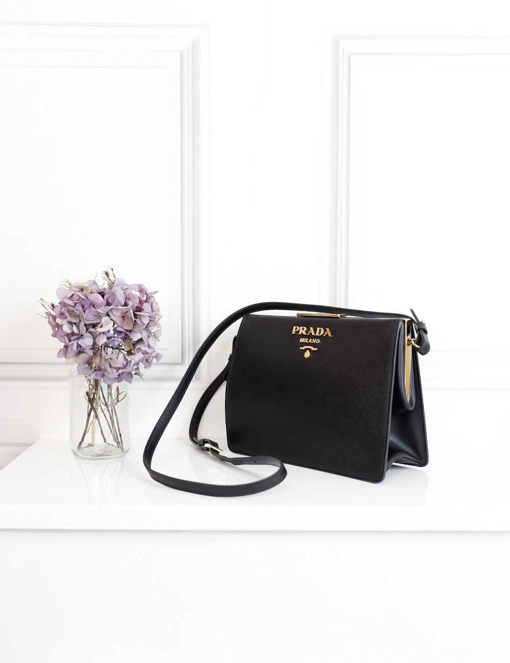 prada light frame leather bag