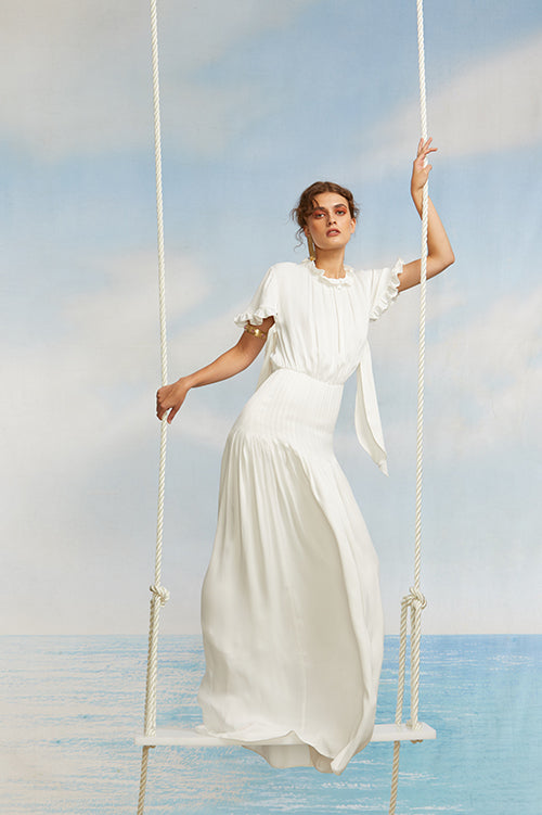 Cynthia Rowley Spring 2018 Look 10 featuring a white silk maxi dress with short sleeves