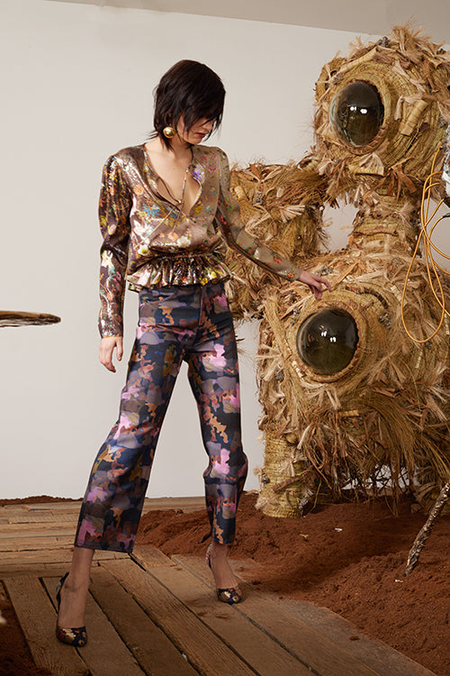 Cynthia Rowley Pre-Fall 2018 Look 12 featuring a long sleeve peplum top in metallic floral print fabric and silk came print pants