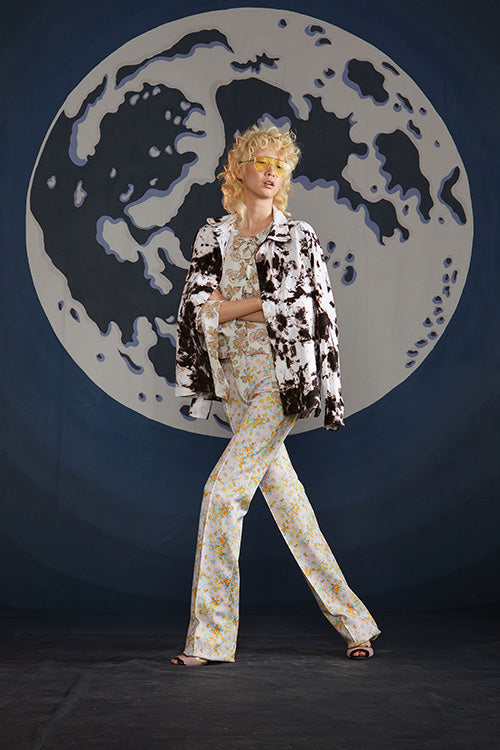 Cynthia Rowley Spring 2019 look 21 featuring a white and brown tie dye jacket on top of a floral top and matching pant