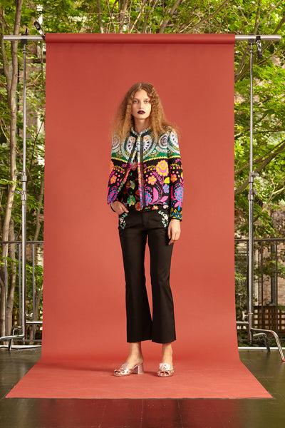 Cynthia Rowley Resort 2017 Look 3 featuring a vibrant jacket and black pants