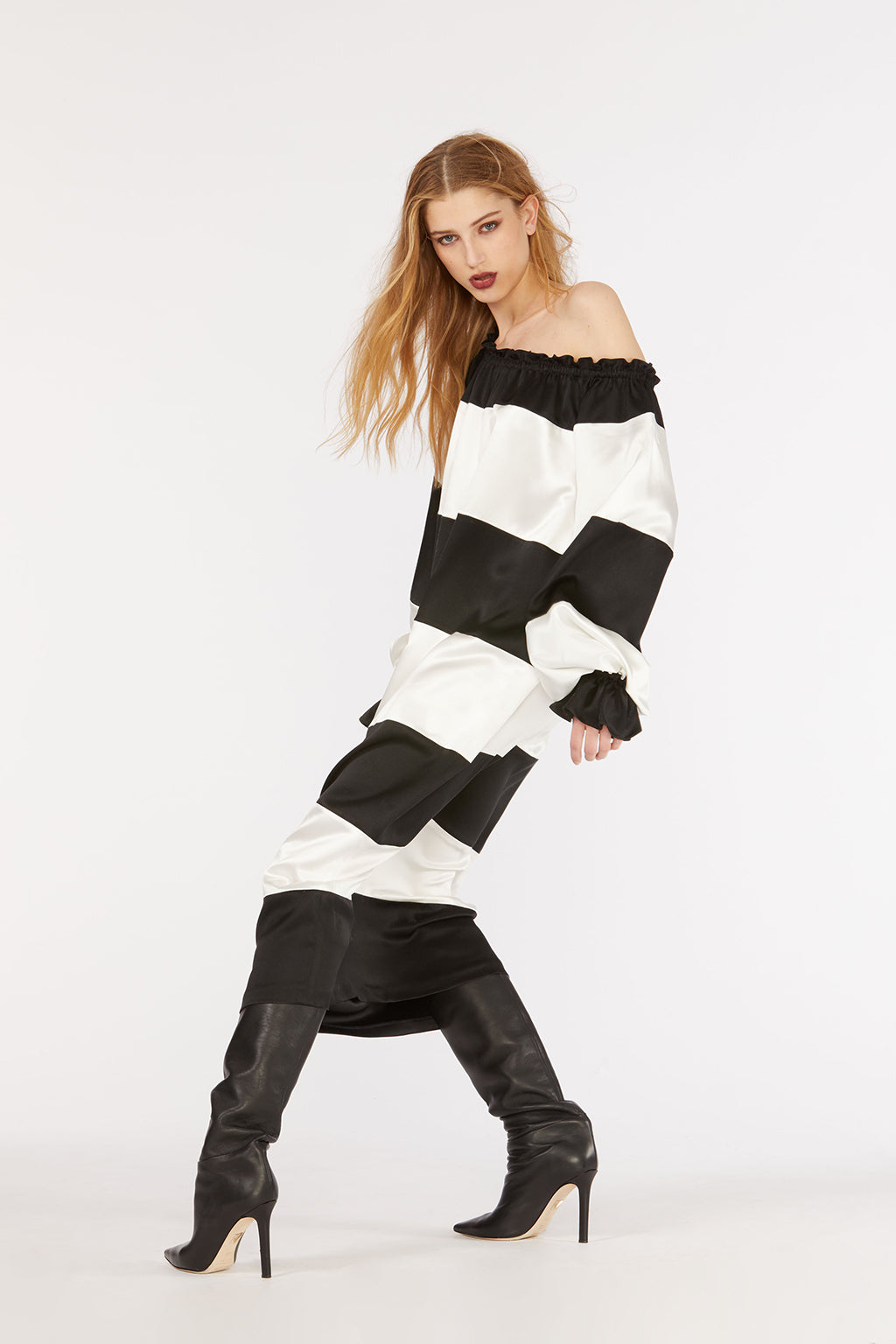 Cynthia Rowley Fall 2018 look 9 featuring a black and white stripe off-shoulder dress. 