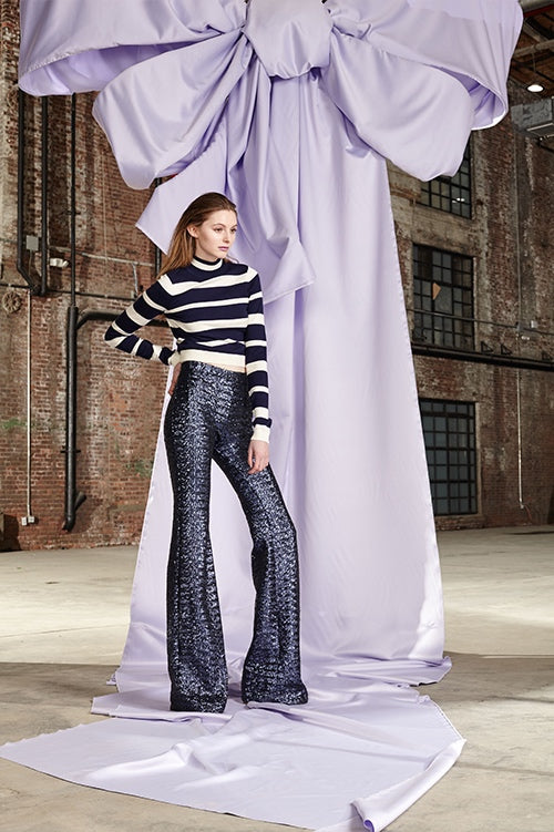 Cynthia Rowley Fall 2017 Look 16 featuring a navy and white striped cropped turtleneck sweater and navy sequin flare pants