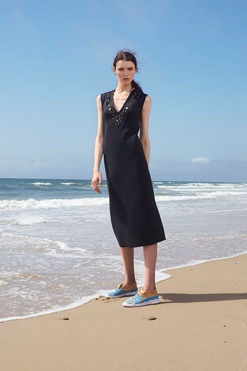 Cynthia Rowley Spring 2016 look 25 featuring a black bonded nylon midi length sleeveless dress with embellished v-neck line