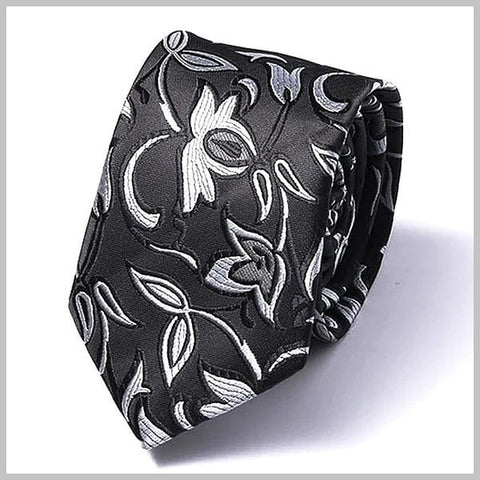 シルク製の黒のスキニー花柄ネクタイ