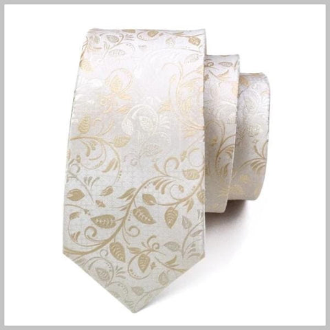 Cravatta floreale bianca e oro in seta