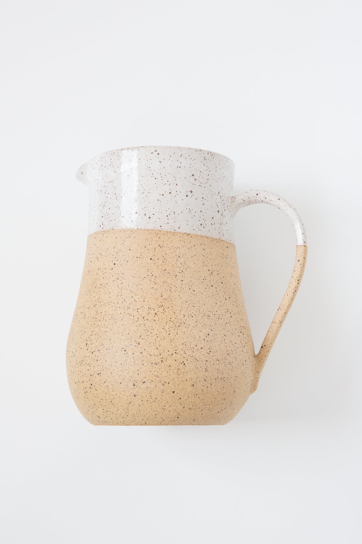 https://cdn.shopify.com/s/files/1/1916/7569/products/RachaelPots_LargeSpeckledPitcher_Nude_01_1600x.jpg?v=1571702907