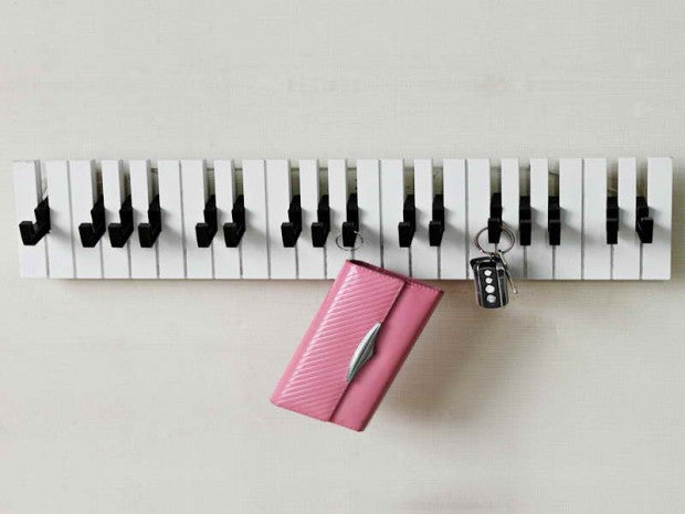 Creative-Coat-Racks-With-Piano-Design-and-Pink-Wallet