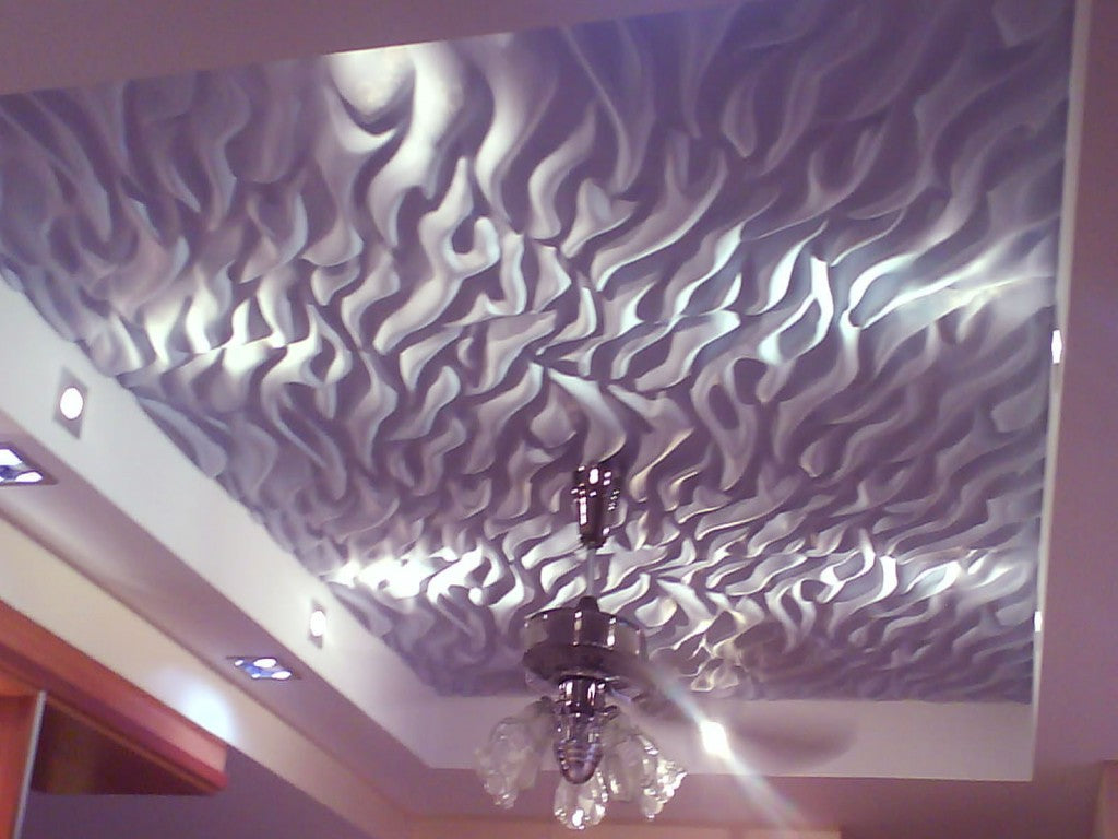 Gypsum-Bedroom-Ceiling-Designs-2013-32-Gypsum-Ceilings-Designs- A crumply textured ceiling, like waves on the top of the sea