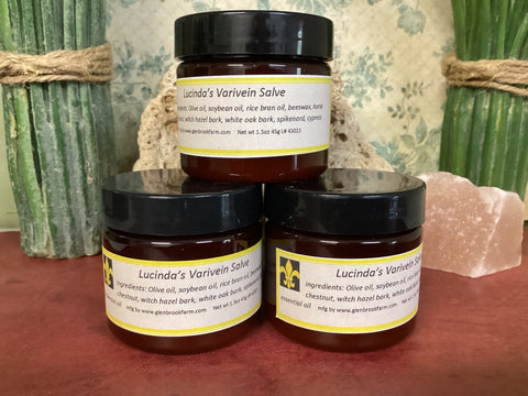 3 jars of salve in a brown jar 