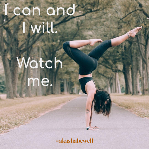 Woman in yoga handstand