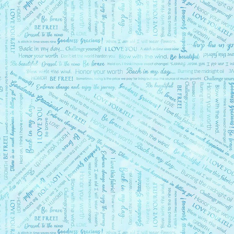 Goodness Gracious Pale Blue Collaged Phrases Fabric